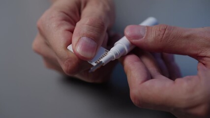 Technician cleaning adapter contacts from memory card using specialized solution and fine-tipped applicator, ensuring optimal data transfer and preventing errors for modern digital devices, close-up.
