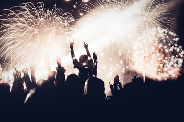 crowd watching fireworks at New Year