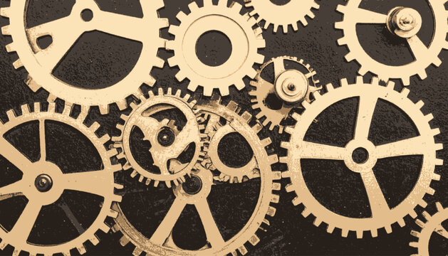 A close-up view of mechanical gears in gold color, with different sizes overlapping on a dark background