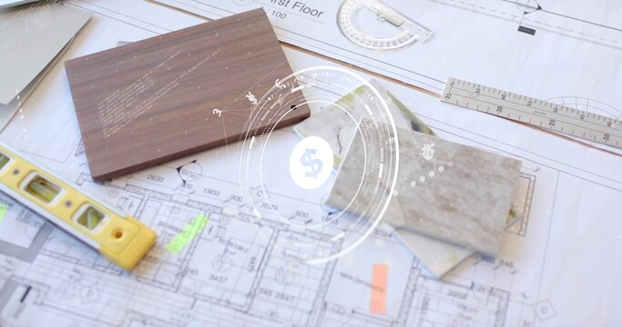Showing architectural blueprints on studio desk with wood veneer tile swatches and measuring tools