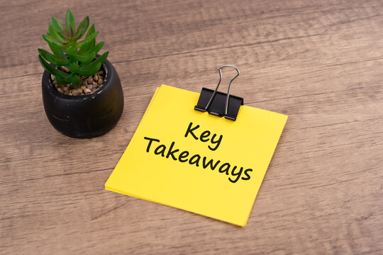 Key Takeaways words on adhesive note - business concept