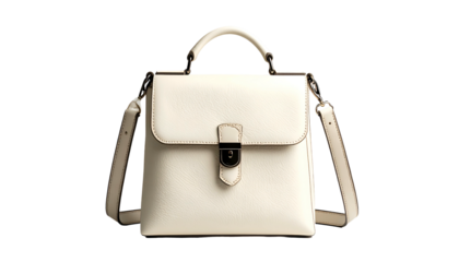 A cream-colored leather satchel with a top handle and shoulder straps, isolated on black