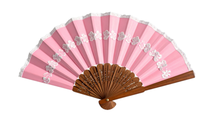 A pink and white, open hand fan with wooden ribs and floral lace accents on a dark background