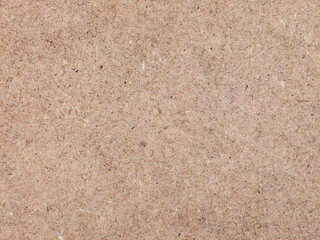 Brown hardboard texture background of a compressed wood panel