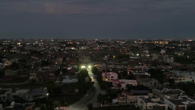 An aerial hyperlapse of city lights after dusk