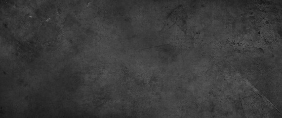 Dark grey textured concrete wall background