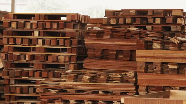 PILE OF WOODEN PALLETS