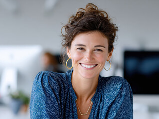 Confident businesswoman smiling at office workplace