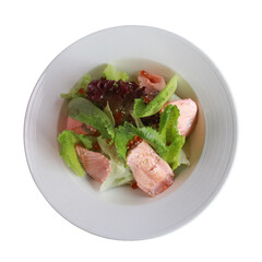 A Fresh and delicious salmon salad on a white plate. This vibrant dish features fresh salmon, crisp greens, and colorful additions, perfect for a healthy meal