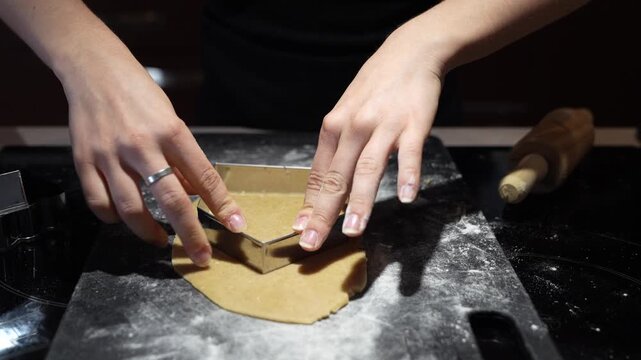 Woman hands cooking cake - close up video 4k