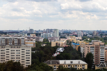 Cityscape View with Modern Architecture Amidst Cloudy Skies