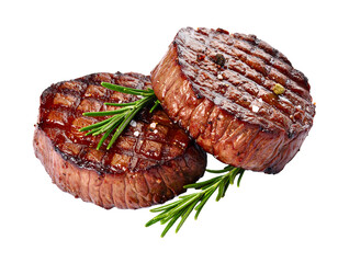 Two grilled beef tenderloin steaks with rosemary sprigs isolated on transparent background
