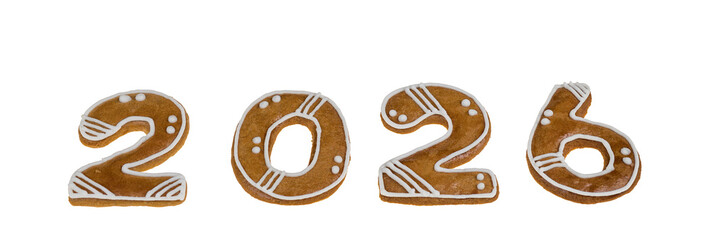 Closeup of happy New year 2026 gingerbread number isolated on a panoramic white background. Set of sweet decorated baked cookies in two, zero and six numerals shape from traditional Czech Xmas pastry.
