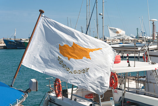 The national flag of Cyprus is waving in the wind. Limassol old port, Cyprus