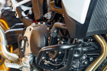 Detailed view of a motorcycle's engine showing intricate components and modern design features
