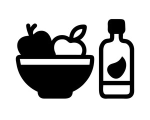 Bowl of apples and a bottle of apple cider