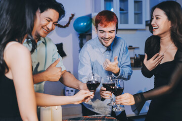 Diversity, dinner and group of people toast celebration together at party. Friends, happy and celebrate with food, wine and friendship for love, support and cheers champagne at business function
