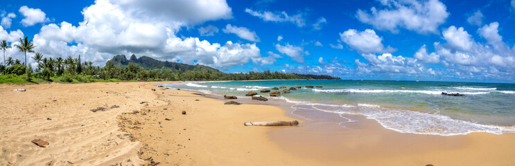 Panoramic view of Anahola Beach in the north coast of Kaua'i, with the iconic Kalalea mountain range in the background, Hawaii, USA