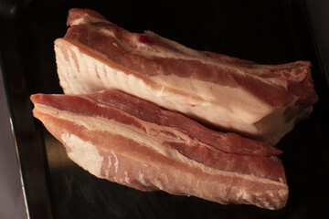 Farm raised pork meat shown as a food product, reflecting traditional agriculture, natural food production, and protein source in everyday cuisine.