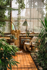 Rustic greenhouse reading nook with tropical foliage for concepts of comfort, serenity and eco-friendly interior