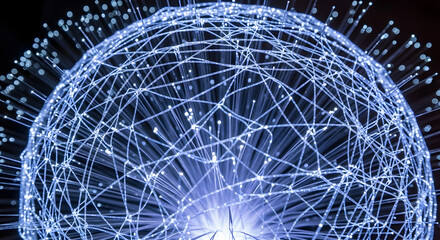 Futuristic abstract sphere of glowing blue light lines, symbolizing global communication, data flow, and the intricate connections within a high-tech digital information network