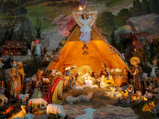 Traditional Christmas crib figures representing Holy Family, three wise men, shepherds and animals