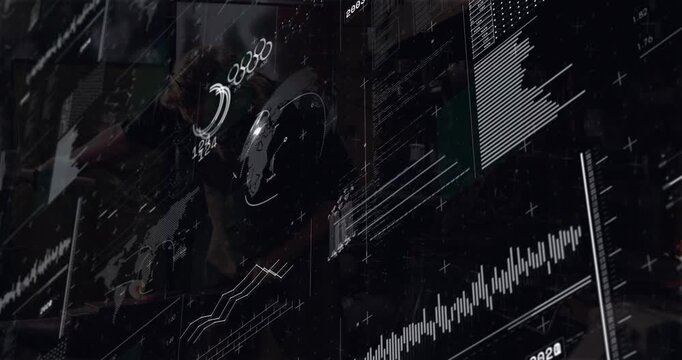Technician examining sphere in tech workshop, causing holographic charts measuring performance