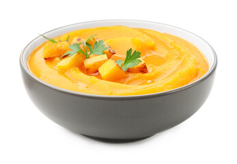 Delicious pumpkin cream soup with parsley isolated on white