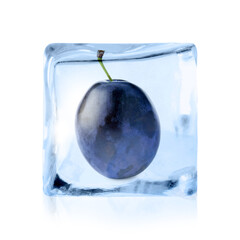 Fresh plum inside ice cube isolated on white