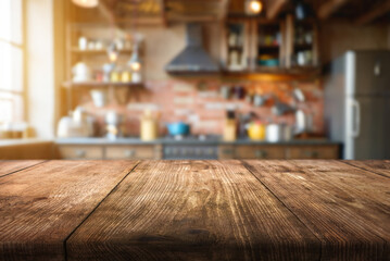 warm cozy kitchen and wooden surface in the foreground