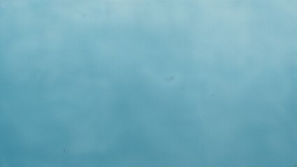 a minimalist, abstract style with a solid, uniform layout. The subject is a plain, textured background in a vibrant shade of light blue. The texture appears subtle, with faint variations in tone that 