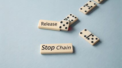 Release and Stop Chain Concept with Domino Effect on Blue Background