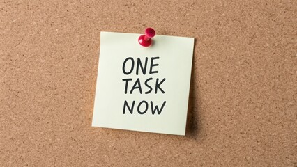 Simple Reminder Note for Task Management on Cork Board Surface