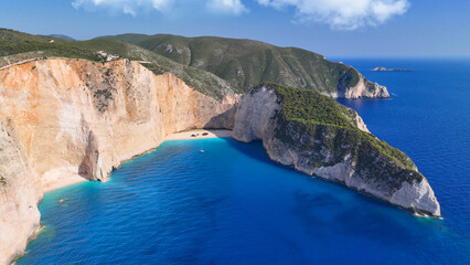 Aerial drone photo of one of the most photographed beaches in the world called navagio or shipwreck...