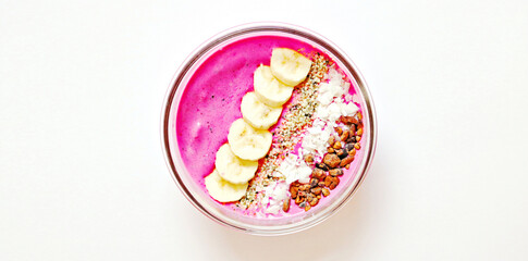 A plate of sweet candy corn and Easter eggs is an isolated yellow and white dessert snack