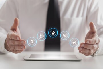 CRM concept with business icons around a digital tablet