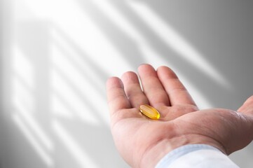 Dietary supplement, hand holding pills, drugs