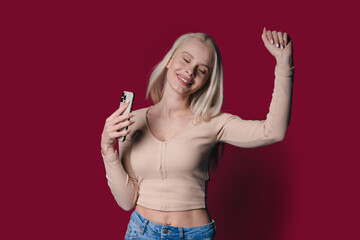 A Beautiful, Joyful, and Happy Young Woman Fully Enjoying Energizing Music While Having a Great Time