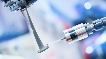 Precision cnc coordinate measuring machine analyzing metal blade of turbine for accuracy