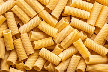 Fototapete Zu Essen Uncooked rigatoni pasta.Top view.  © Jiri Hera