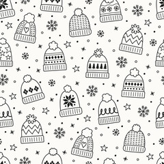 Seamless texture with colourful hand drawn winter hats. Christmas background design. Vector illustration