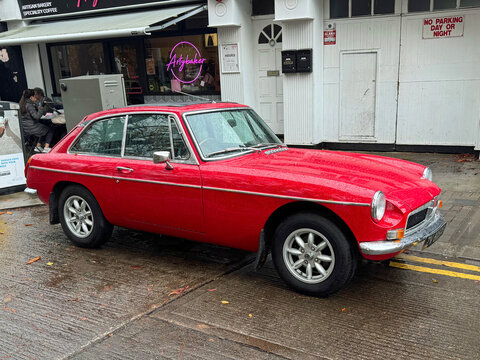 Dublin, Ireland - October 19, 2025: MG B GT roadster parked by the side of the road.