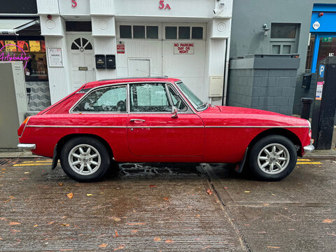 Dublin, Ireland - October 19, 2025: MG B GT roadster parked by the side of the road.