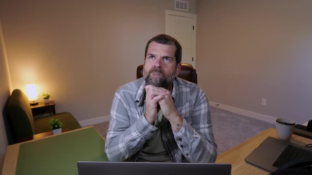 Remote Worker Struggling to Keep Sanity While Being Lonely Trying to Problem Solve in Dark Winter Days