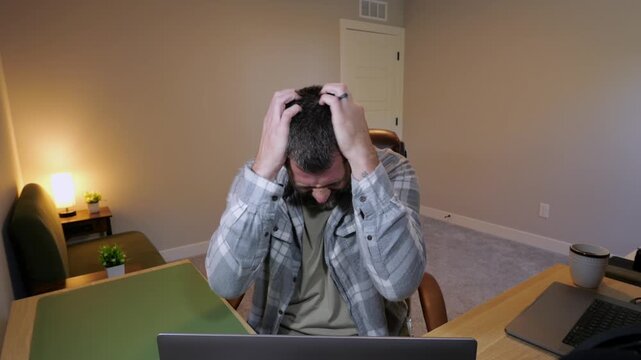 Remote Worker Struggling to Keep Sanity While Being Lonely Trying to Problem Solve in Dark Winter Days