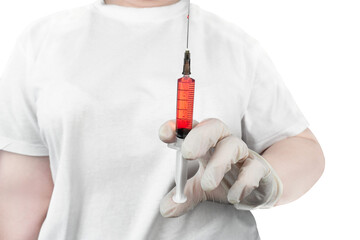 A healthcare professional in a white uniform holding a large syringe containing red liquid, symbolizing treatment or vaccination, isolated on transparent background