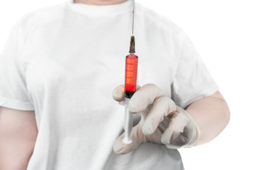 A healthcare professional in a white uniform holding a large syringe containing red liquid, symbolizing treatment or vaccination, isolated on transparent background