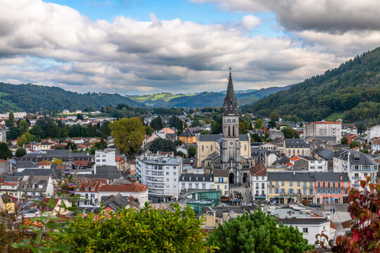 The town of Lourdes and the Sacred Heart Church in the Neo-Romanesque style, in the Hautes-Pyr&eacute;n&eacute;es, Occitanie, France.