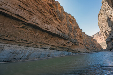 Desert River Cutting Through the Layers of Rock