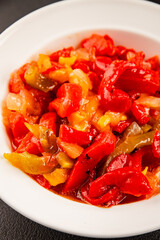 Roasted pepper salad vegetables dish natural product tasty snack fresh delicious gourmet food background on the table rustic top view copy space keto and paleo diet vegan and vegan food